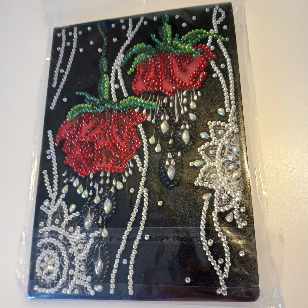 Leather bound journal dripping rose vines